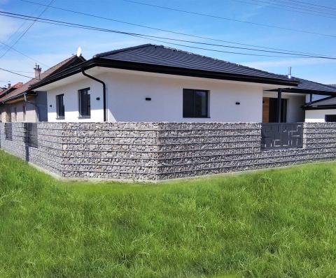 Modern bungalow and gabion fence premium