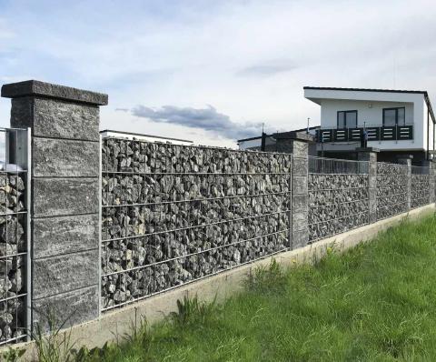 long gabion fence with posts